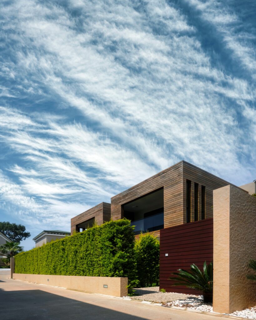 Modern houses with green plant wall